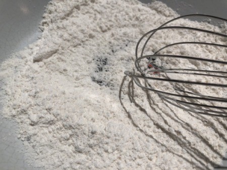whisking flour