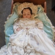 Identifying the Maker of a Porcelain Doll - baby doll in fancy gown