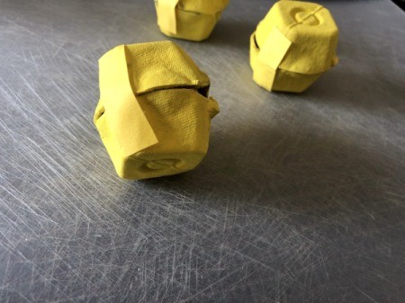 Egg Carton Easter Chick Containers - stack the egg holders one on top of another and glue the paper on to create a hinge