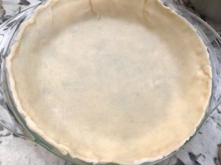 pie dough in pan