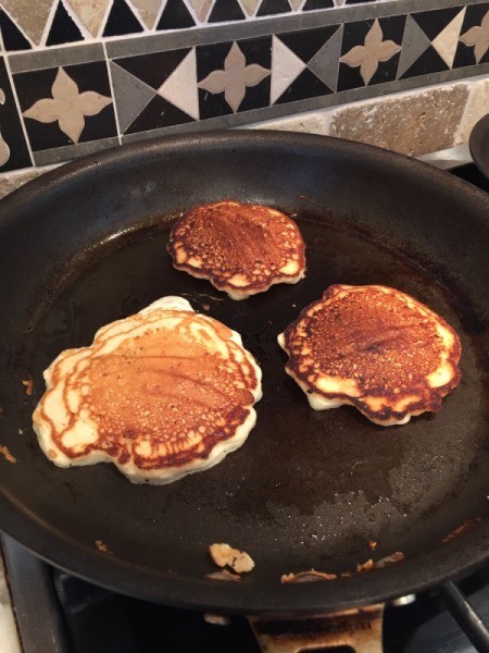 Pancakes in a frying pan.