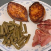 Baked Sweet Potato Halves on dinner plate