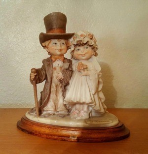Value of 1980s Capodimonte Porcelain Figurines  - boy with top hat and girl in period bridal dress