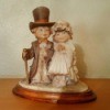 Value of 1980s Capodimonte Porcelain Figurines  - boy with top hat and girl in period bridal dress