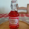 A bottle of homemade raspberry red wine vinegar.