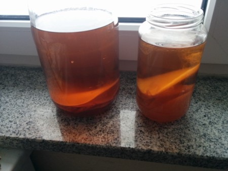 Jars of vinegar with floating "mothers".
