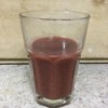 A glass of potato and beet juice.