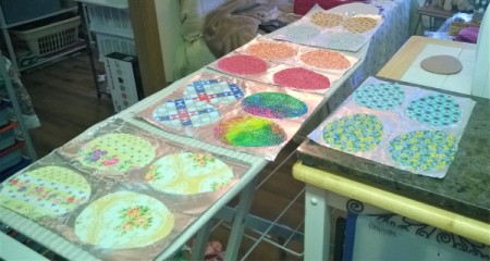 Flat and Fancy Hanging Egg Decorations - eggs on foil drying after applying mod podge