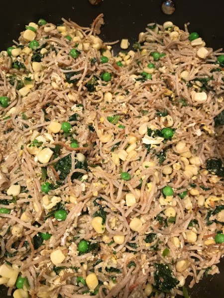 veggies added to noodles and egg