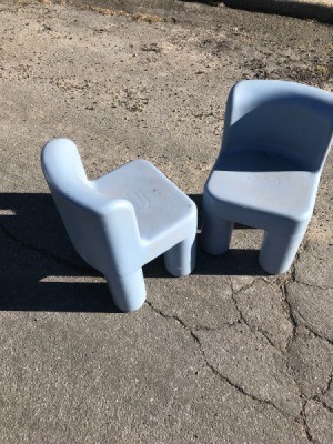 Two plastic children's chairs from an estate sale.