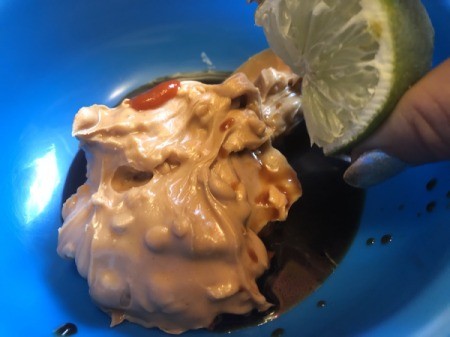 squeezing lime on peanut butter
