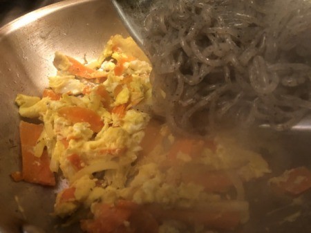 noodles added to egg