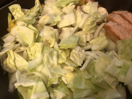 cabbage added to pan