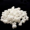 white packing peanuts on black background