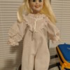 Identifying a Porcelain Doll - blond doll in one piece garment