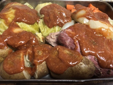 Corned Beef and veggies covered with sauce