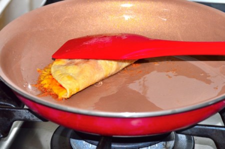 closed tortilla with cheese added