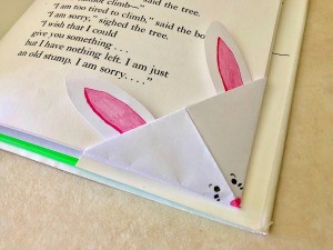 Folded Paper Bunny Corner Bookmark - closeup of bookmark on page corner