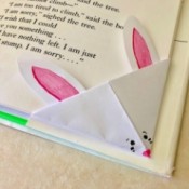 Folded Paper Bunny Corner Bookmark - closeup of bookmark on page corner