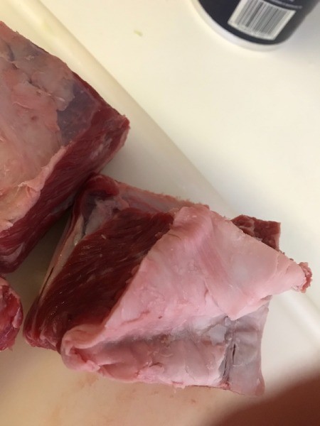trimming fat from Raw Short Ribs