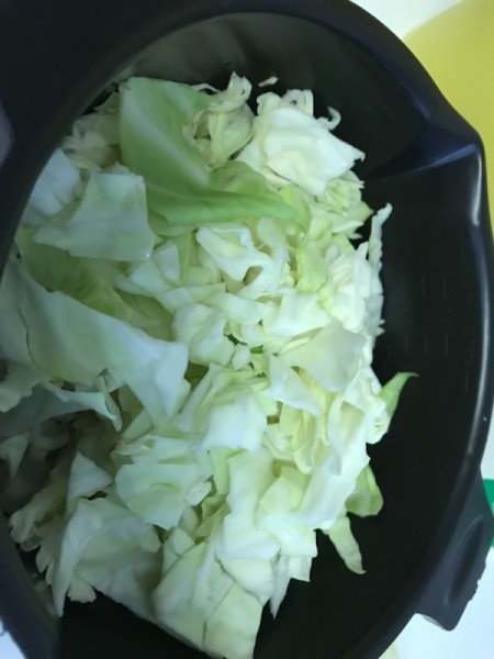 cut Cabbage steaming in pan