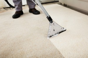 Carpet shampooer cleaning white carpet