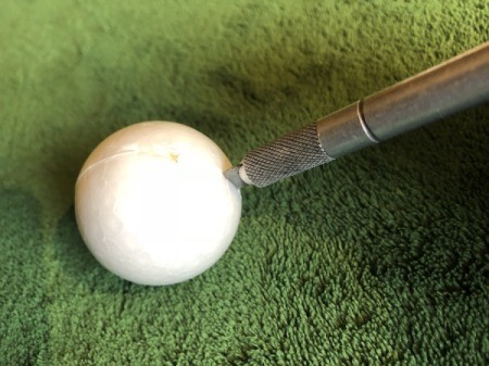 Styrofoam Ball Bunny Statue - make two cuts in one ball to insert the ears