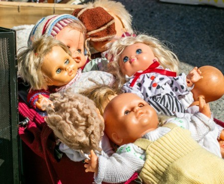 Pile of old baby dolls.