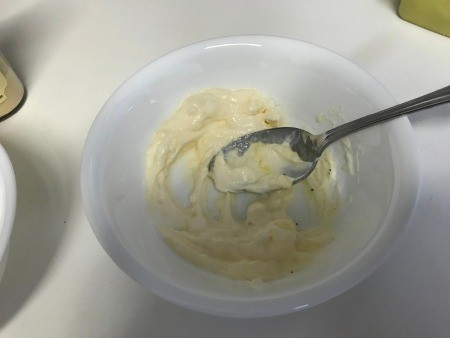mixing mayonnaise and spices in bowl