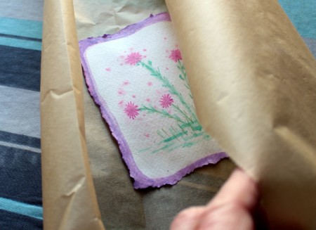 Floral Art Greetings Card - place dried painting between parchment paper and iron to flatten