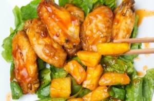 Baked pineapple chicken wings on a plate