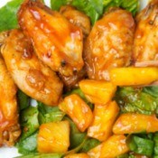 Baked pineapple chicken wings on a plate