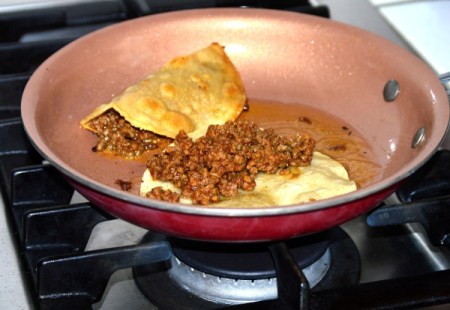 Tortilla folded over meat