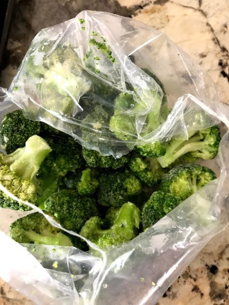 A bag of broccoli pieces.