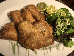 cooked fish on dinner plate