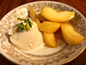 Caramelized Apples in bowl with ice cream