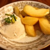 Caramelized Apples in bowl with ice cream