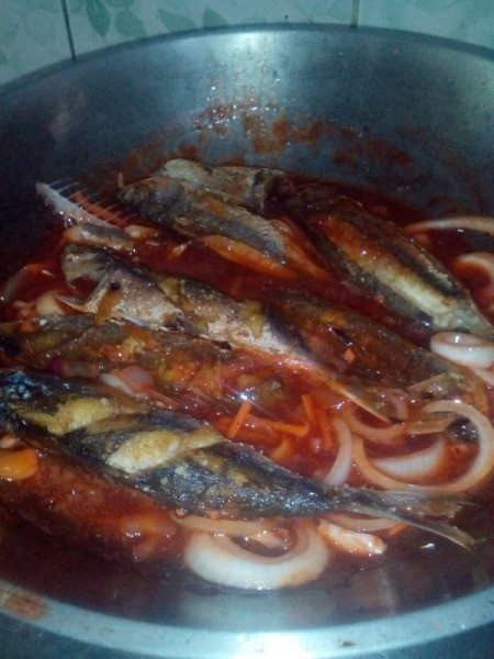 Fish dipped in sauce