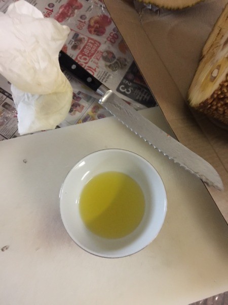 A dish of oil to keep the jackfruit sap from getting sticky.