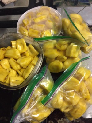 Sections of jackfruit in plastic bags and containers.