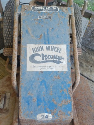 Value of a Brister's High Wheel Champ Mower - partial view of mower