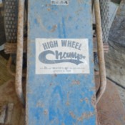 Value of a Brister's High Wheel Champ Mower - partial view of mower