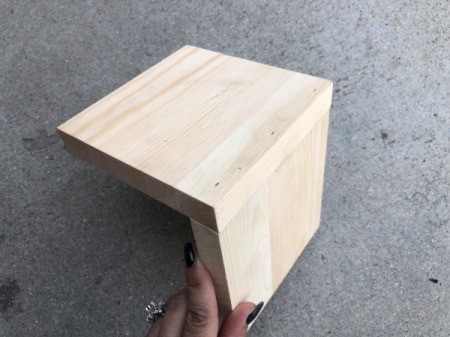 Making Plastic Animal Bookends - nail pieces of wood together