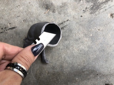 Making Plastic Animal Bookends - use a razor blade to remove any rough bits of plastic