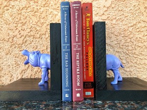 Making Plastic Animal Bookends - holding up books on a shelf