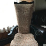 History and Value of an Antique  Chair - dark wood chair with tall wedge shaped back