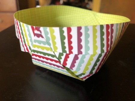 Craft Paper Basket - bring the triangle up and glue at the rim and repeat on the other side