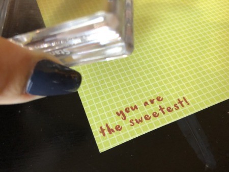 Craft Paper Basket - stamping the grid side of other piece of paper to make a tag with a message