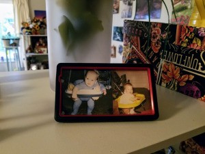 Old Phone Case as Photo Frame - case reassembled with baby photos