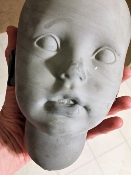 Identifying the Head Mold for a Rubert Doll - face of molded head